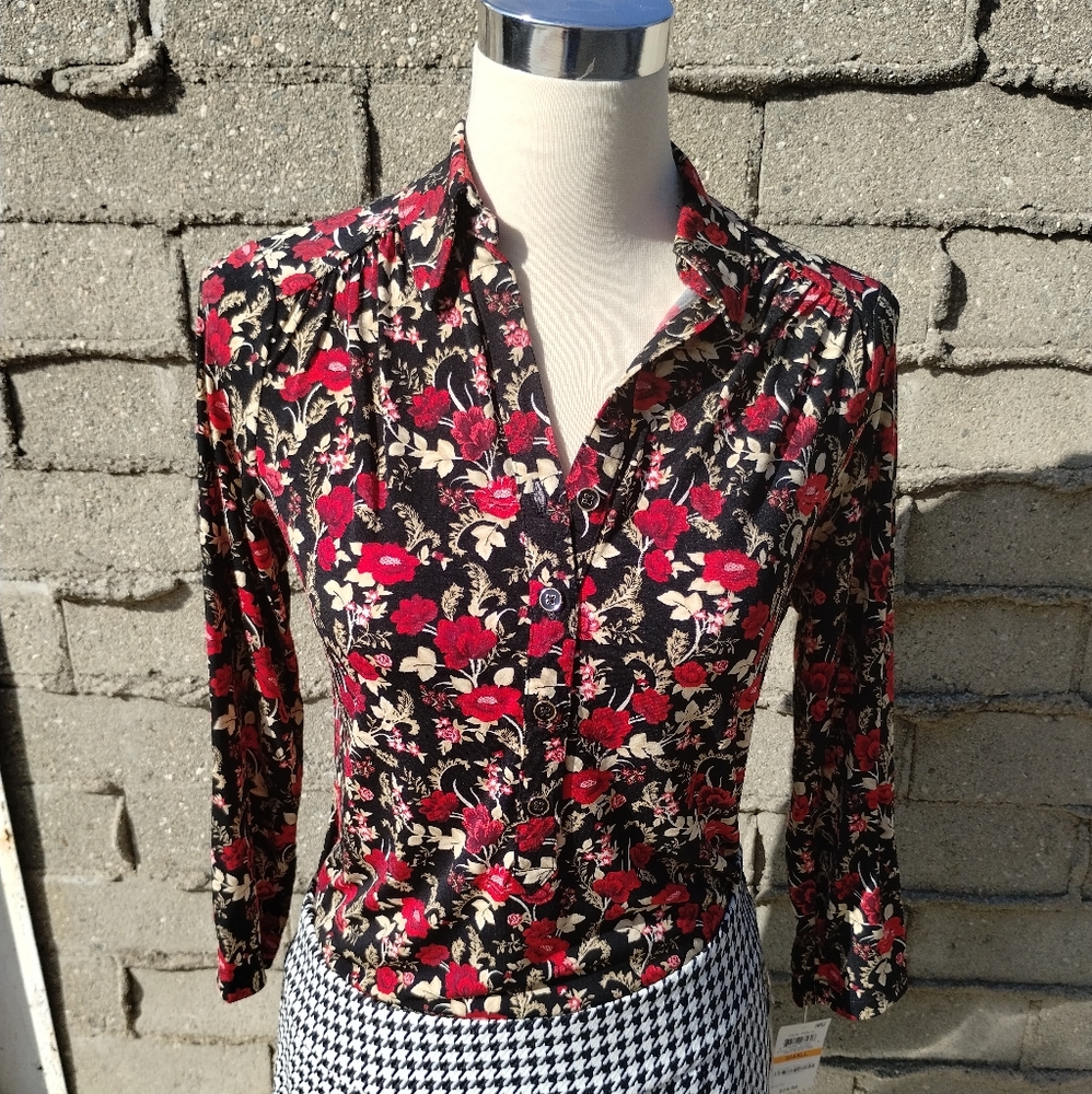 Polyester blouse with buttons.   NWT